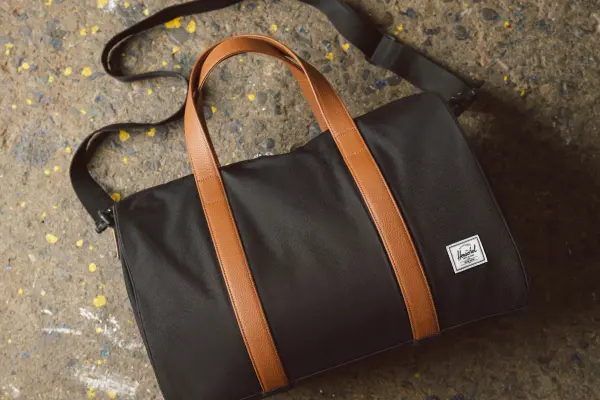 Herschel leather duffle discount bag